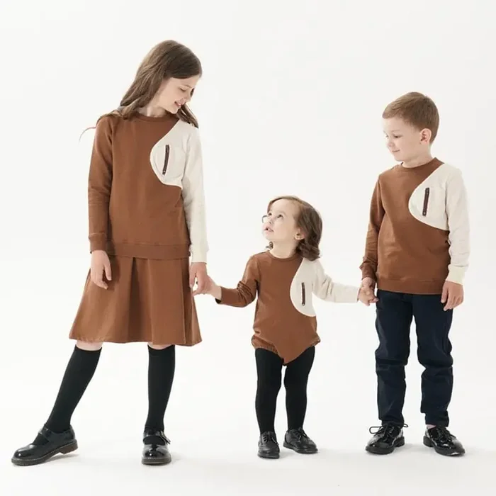 Conjunto para hermanos a juego con bolsillo de sherpa